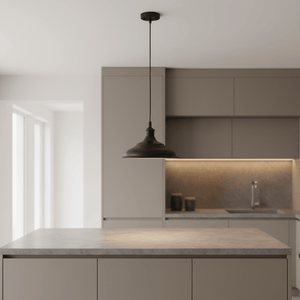 Ducasse Hanging Lamp in matt black suspended above a modern kitchen island with a concrete countertop.
