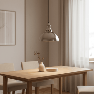 Seattle Hanging Lamp in antique silver above a light timber dining table in a contemporary setting.