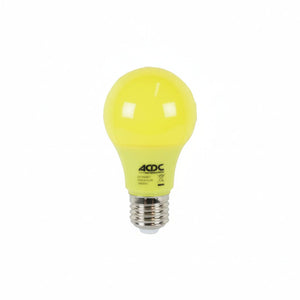 Yellow LED light bulb on a white background