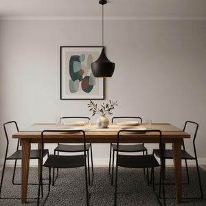Miso Nordic Pendant Light hanging above a wooden dining table set with plates and glasses, featuring a modern decor.