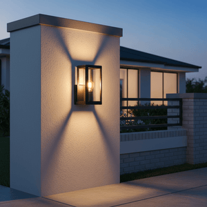 Bhok Ali Square Outdoor Wall Light mounted on a textured wall, casting shadows in the evening.