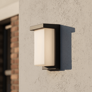 Close-up of the Lone Outdoor Wall Light in black, mounted on a textured wall, showcasing its sleek design.
