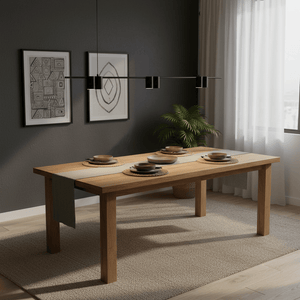 A modern dining table set with plates, under a sleek black linear pendant light.