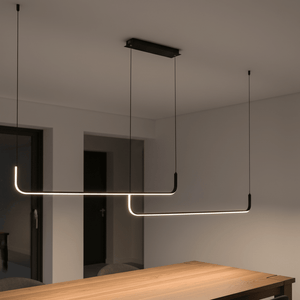 Stylish black 40W LED pendant light with curved design, suspended over a wooden table in a modern interior.