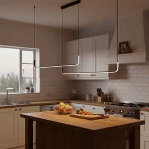 Stylish black LED pendant lights hang above a wooden kitchen island with fresh produce and a glass of wine.