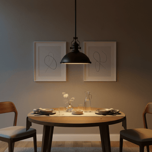 Black Nautical Pendant light hanging above a wooden dining table set with plates and a vase.