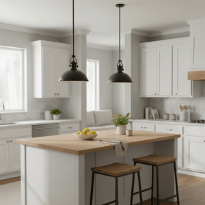 Two black nautical pendant lights hang above a wooden kitchen island with a bowl of lemons.