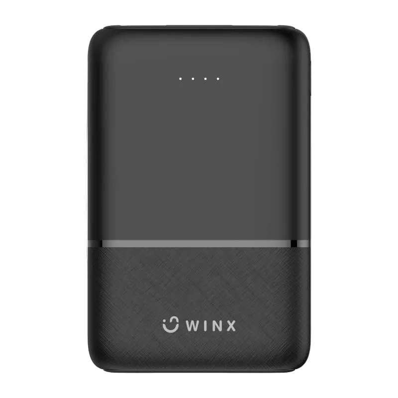 A black 5000mAh power bank with a smooth top surface and textured bottom, featuring four LED indicator lights.