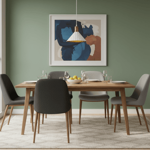 A modern dining setup featuring a white iron pendant light above a wooden table with gray chairs and a fruit bowl.