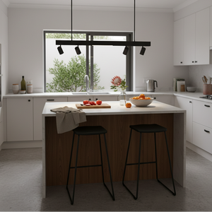 Black LED pendant light above a modern kitchen island with stools and fruit bowl.