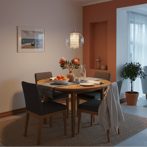 Dining area with a round table, chairs, and decorative elements in a home setting.
