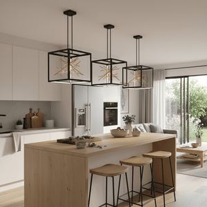 Three black and gold pendant lights hang above a wooden kitchen island, enhancing a modern kitchen setting.