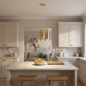 Gold-finished pendant light with crystal accents hanging above a kitchen island with fruit bowl