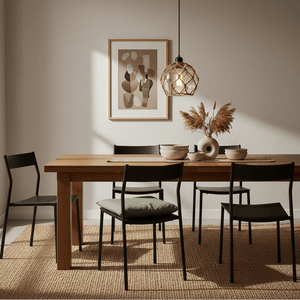 Stylish dining setup featuring the Constantia Rope Pendant Light above a wooden table with decorative bowls and a vase.