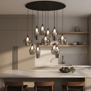 Hailo 11 Light Smoke Glass Pendant hanging above a kitchen island, showcasing its elegant design and warm lighting.