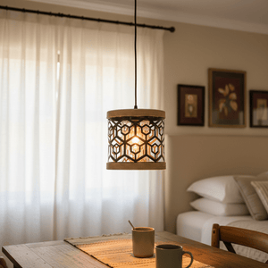 Colston Rope Pendant Light hanging above a dining table with warm amber glow, surrounded by a cozy setting.