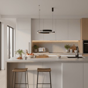 A modern kitchen featuring a black LED pendant light above a concrete countertop, with wooden cabinets and bar stools.