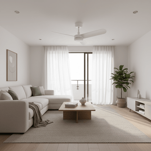 Modern living room featuring a white ceiling fan, light curtains, and a cozy sofa with a coffee table.