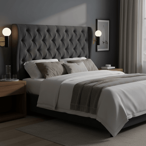Elegant bedroom scene featuring the Ollie Black Marble Wall Light mounted beside a tufted headboard, providing soft accent