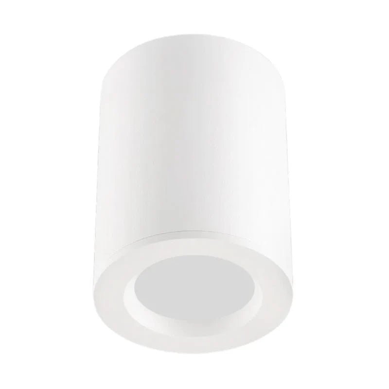 White surface mount downlight holder with a cylindrical design, suitable for various indoor and outdoor settings.