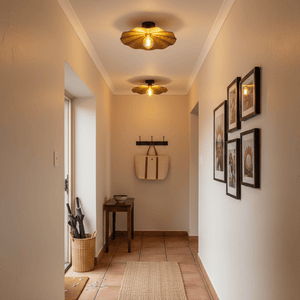 Detail of a hallway featuring two golden flower ceiling lights, enhancing the warm ambiance.