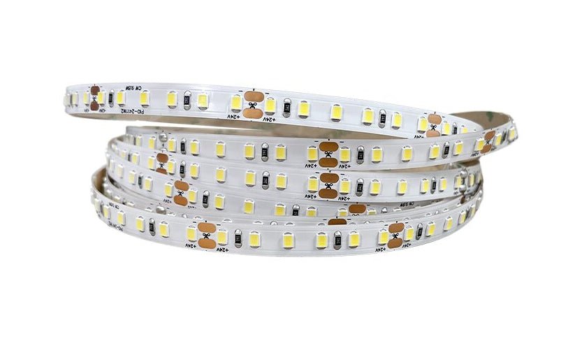 Coiled 24V LED strip light showcasing bright daylight 6000K output and slim 8mm design.