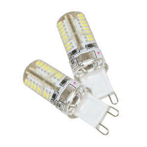 Two LED light bulbs with G9 base on a white background