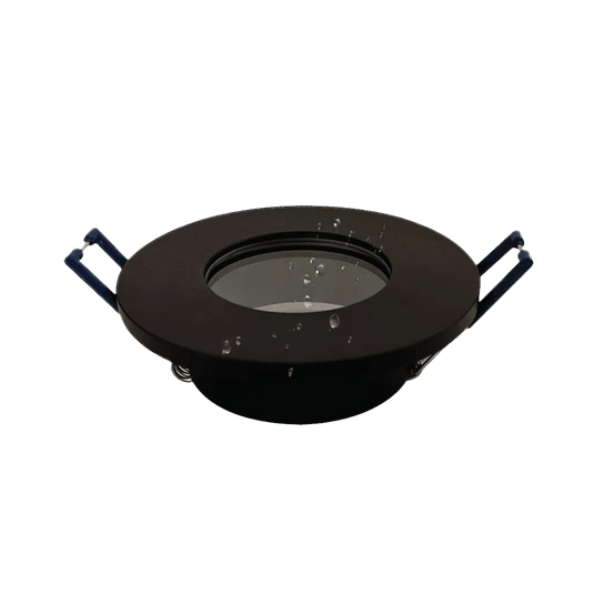 Round black recessed light fixture shown from above with a central opening and side clips