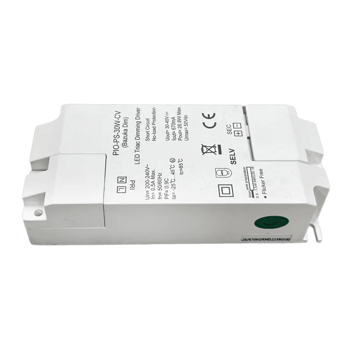 White rectangular LED track dimming driver on green background, showing printed specs and 'Flicker Free' label.