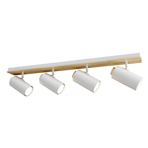 Track light fixture with four white spotlights on a wooden bar against a white background