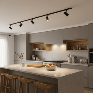 Black 2-meter track light installed in a modern kitchen, highlighting the countertop and decor.