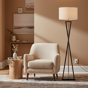 Collins Floor Lamp beside a cozy armchair in a warm-toned living room setting.
