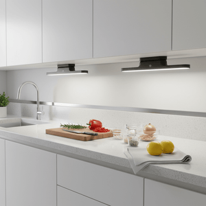 Dimmable cabinet light installed under kitchen cabinets, illuminating a countertop with fresh ingredients.