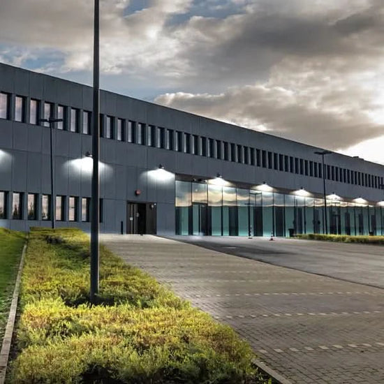 Modern LED floodlights illuminating a South African business exterior