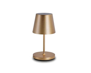 Gold table lamp on a white background