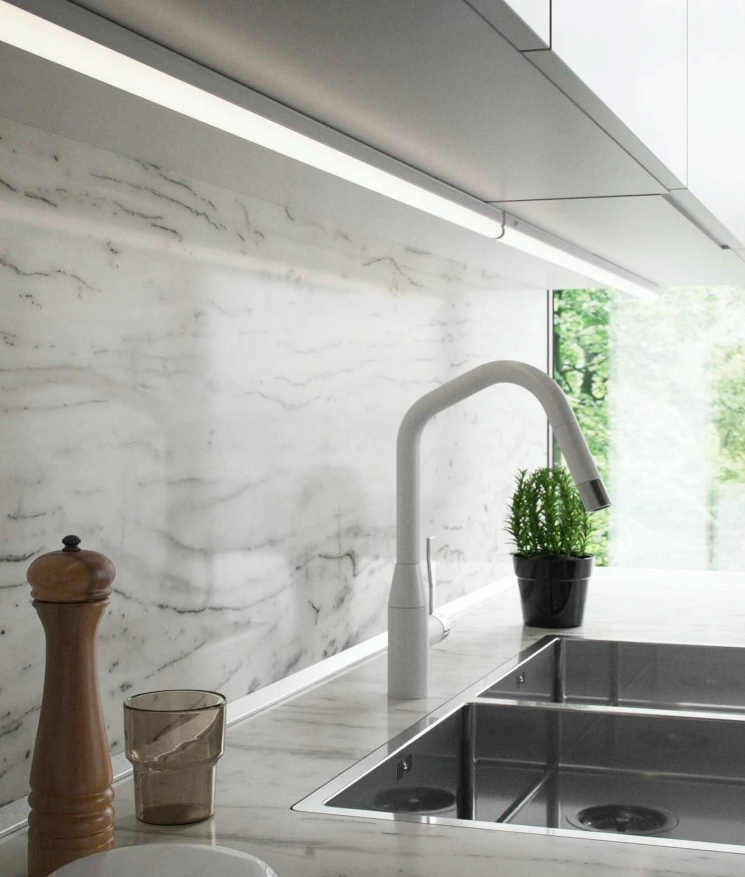 Floating ceiling illuminated with hidden strip lights