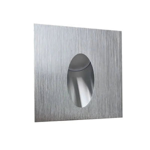 Brushed aluminium square recessed indoor LED step light with a circular opening for illumination.