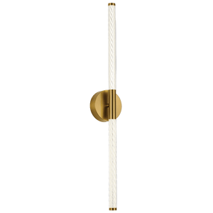 Wall-mounted light fixture with gold base and white cylindrical shade on a gray background