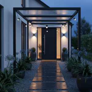 Connectable festoon light cable installed along a covered patio, illuminating a pathway with potted plants.