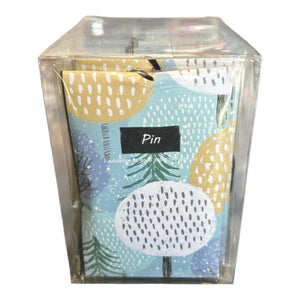 Pine fragrance sachet box with illustrated blue, yellow, white and green sachets in clear packaging