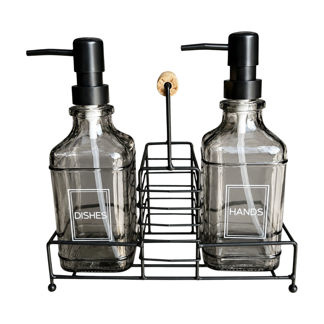 Glass soap dispenser set with smoked grey bottles and black metal caddy