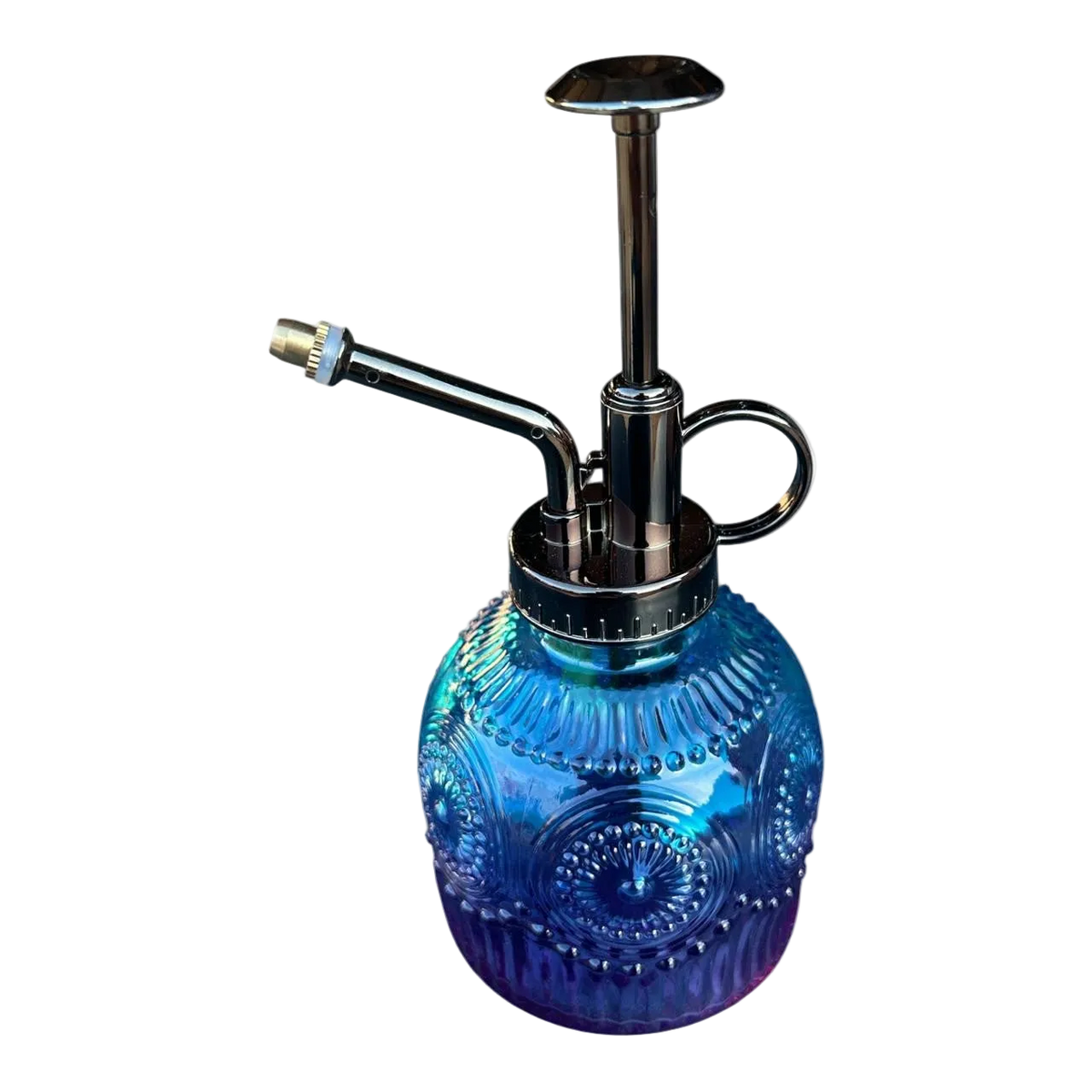 A blue and purple wash-up bottle with a metallic pump and handle, featuring a textured, decorative design.
