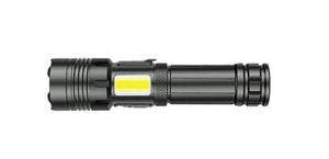 Black flashlight with yellow light on a white background