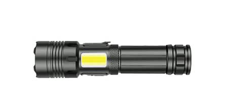Black flashlight with yellow light on a white background