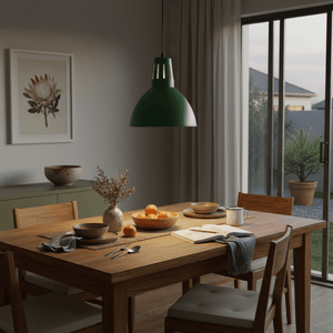 Dining room with green metal pendant 