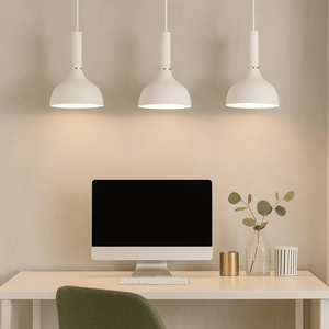 Modern home office with a desk, computer monitor, and green chair under pendant lights.