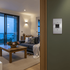 Living room with a sofa, coffee table, and decorative elements.
