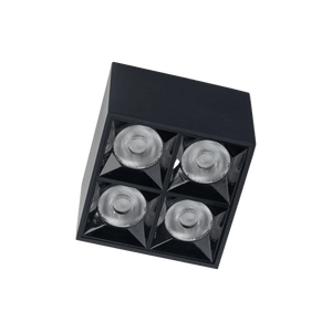 Black square flush‑mounted ceiling downlight featuring four circular LED lenses in a 2×2 grid on a solid green background