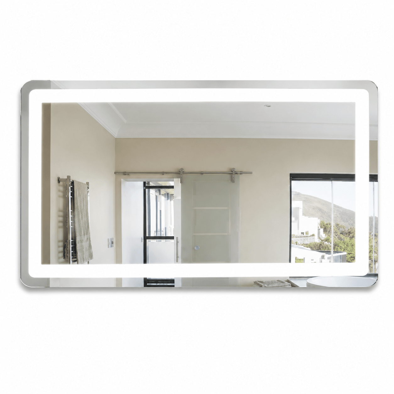 Rectangular mirror with a silver frame reflecting a room interior.