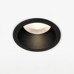 Close-up view of a black recessed LED downlight showcasing its sleek design and textured diffuser.